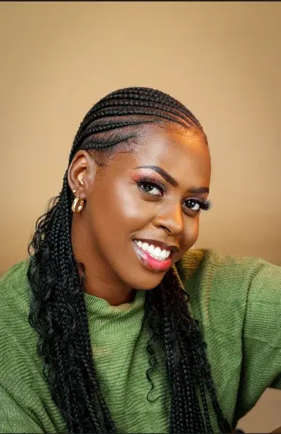 Fulani cornrows braided into long braids with curled ends