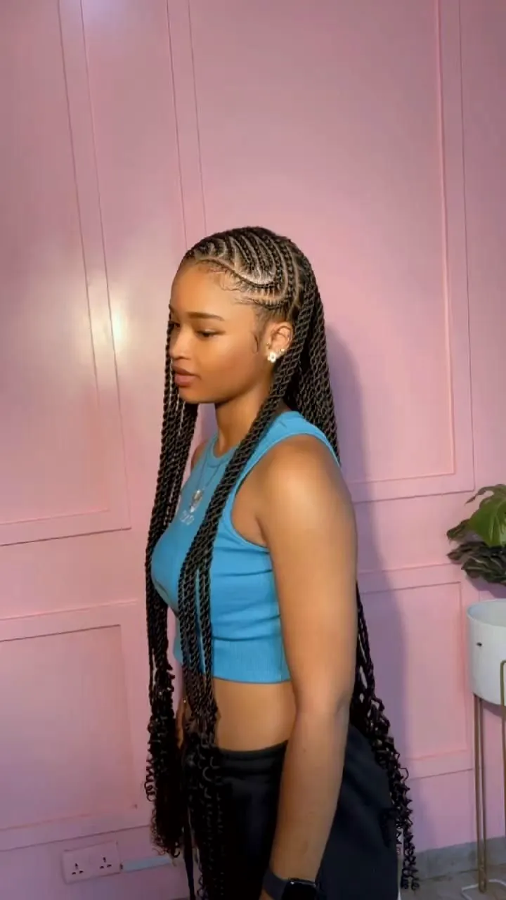 Straight-back cornrows running into long braids