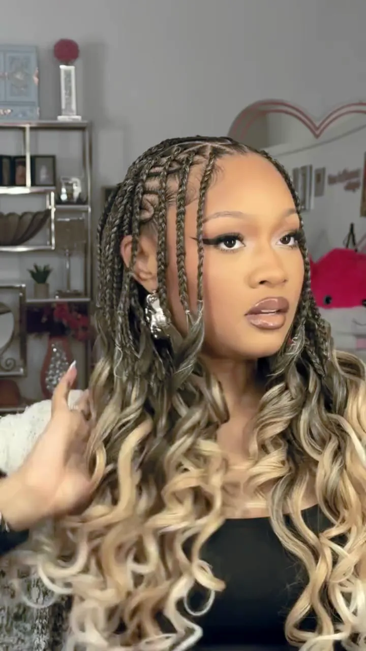 Close detail of braids finished in loose waves